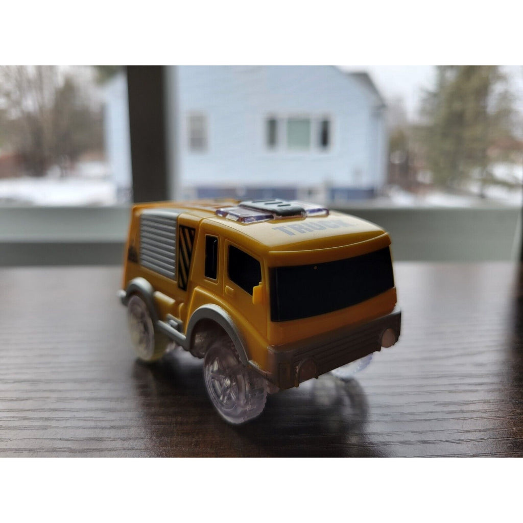 Mindscope Yellow Battery Operated Light Up Trax Car - Auto Truck Vehicle