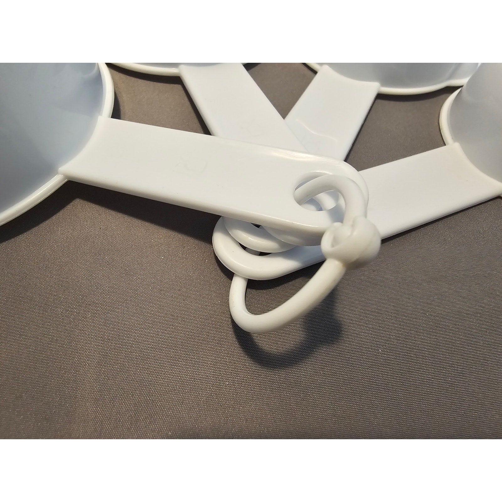 Set of 4 White Plastic Nesting Measuring Cups w/Ring