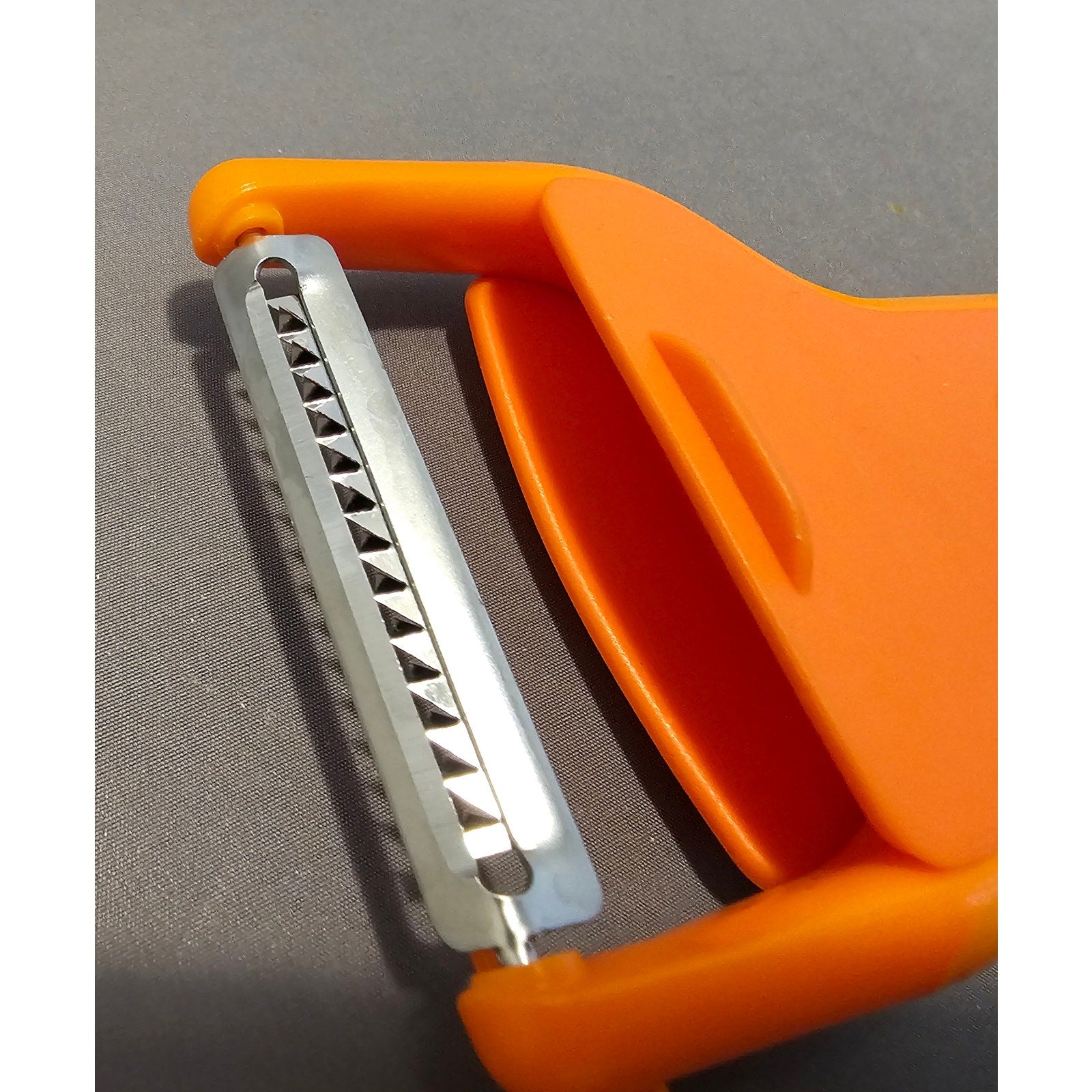 Joseph Joseph SafeStore Orange Vegetable Peeler/Slicer - 5-1/2" long