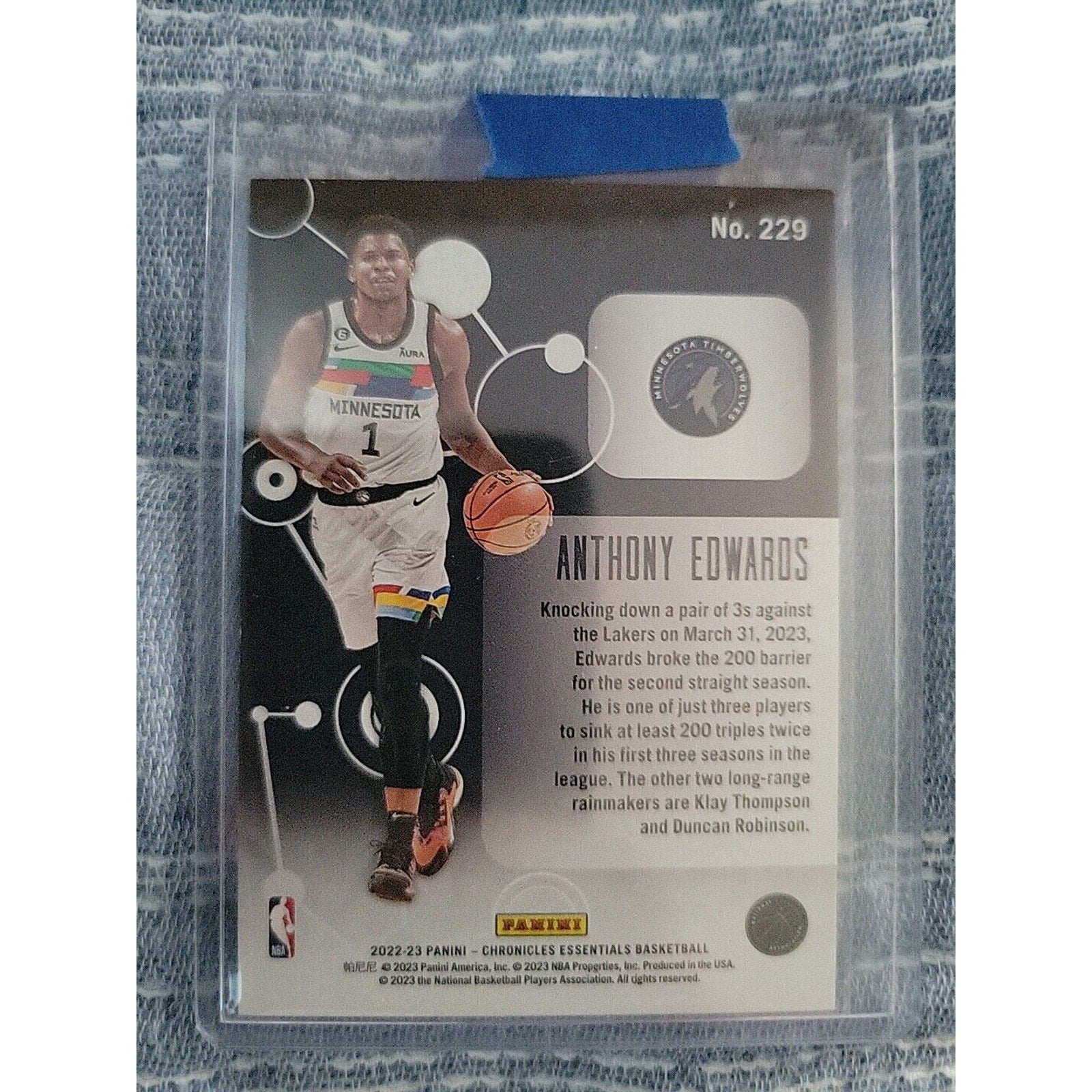 Anthony Edwards 2022-23 Panini Chronicles #229 - Orange Essentials s/n 75/75