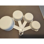 Set of 4 White Plastic Nesting Measuring Cups w/Ring