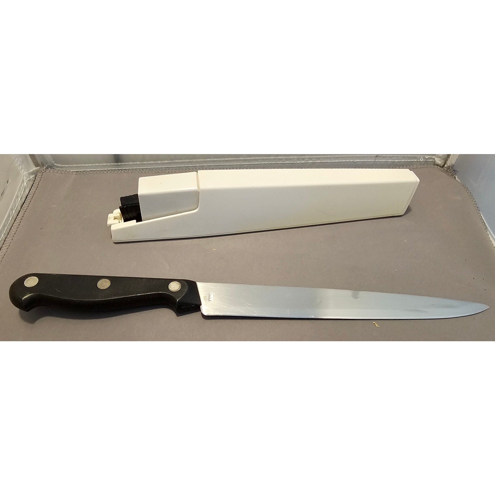 Pampered Chef #1047 - 8" Knife w/Self Sharpening Case - used