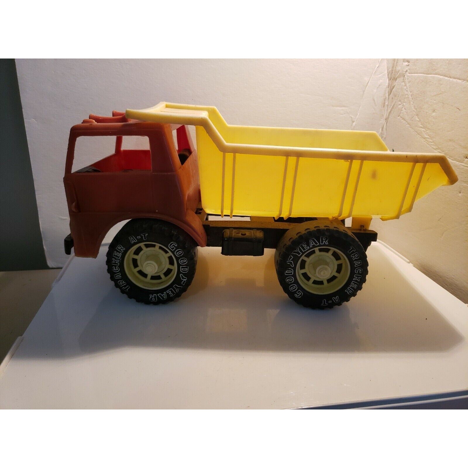 Vintage Gay Toys 12" plastic Dump Truck 620 brown/yellow Goodyear Tracker