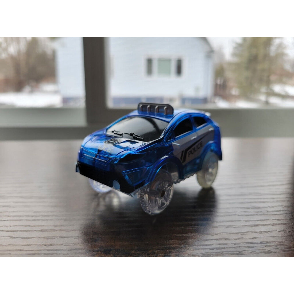 Mindscope Blue Battery Operated Light Up Trax Car - Police Vehicle