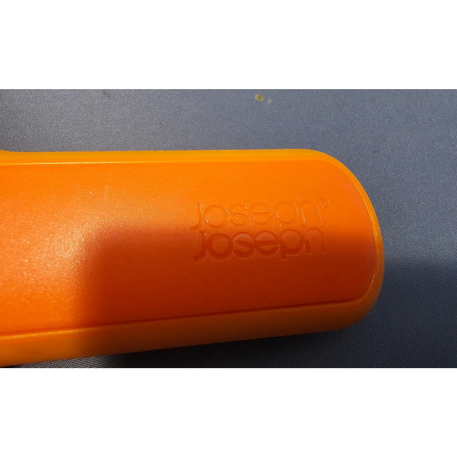 Joseph Joseph SafeStore Orange Vegetable Peeler/Slicer - 5-1/2" long