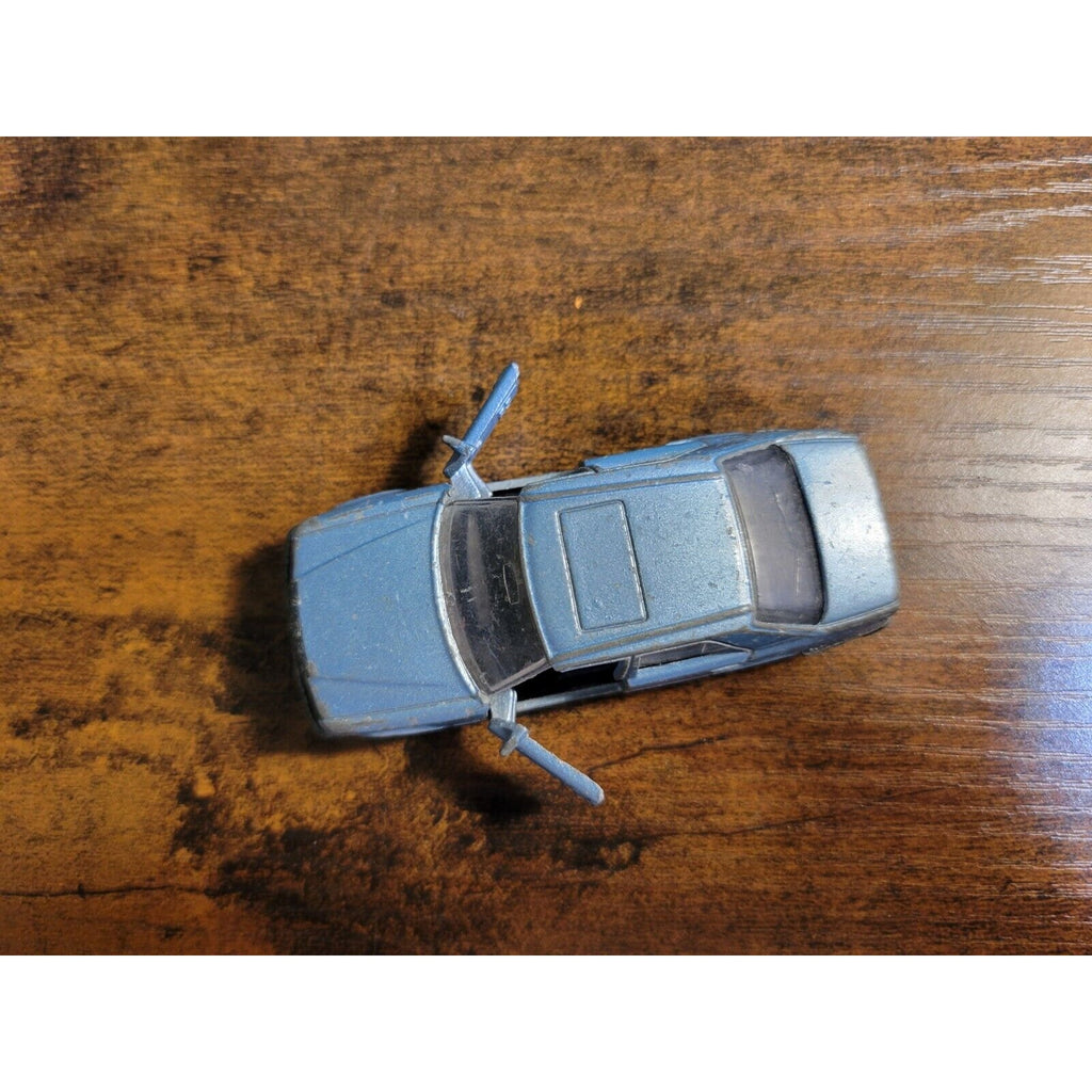 1986 Matchbox - Light Blue Mercedes Benz 300E - 1:61 - Made in Macau -Doors Open