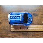 Mindscope Blue Battery Operated Light Up Trax Car - Police Vehicle