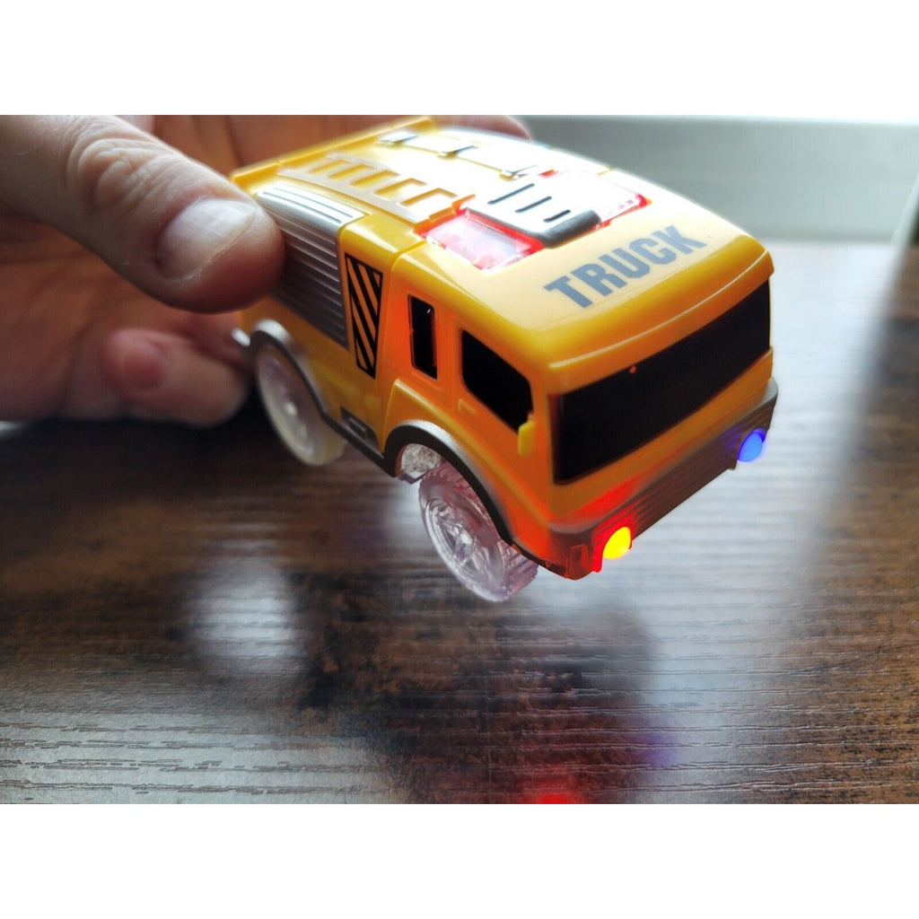 Mindscope Yellow Battery Operated Light Up Trax Car - Auto Truck Vehicle