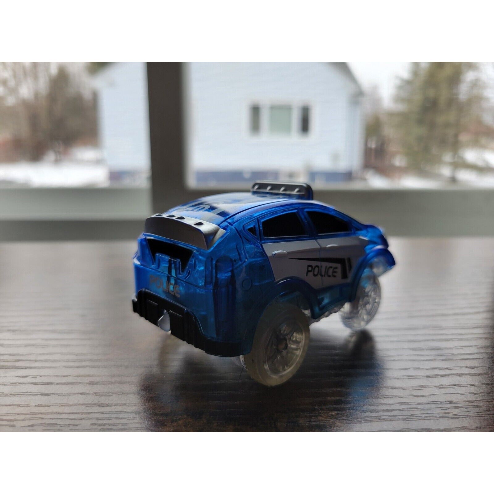 Mindscope Blue Battery Operated Light Up Trax Car - Police Vehicle