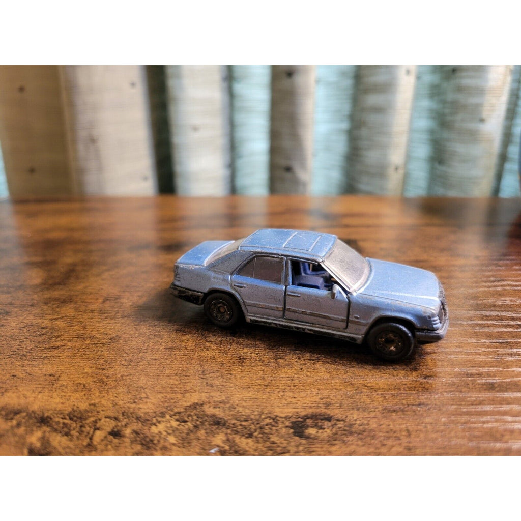 1986 Matchbox - Light Blue Mercedes Benz 300E - 1:61 - Made in Macau -Doors Open